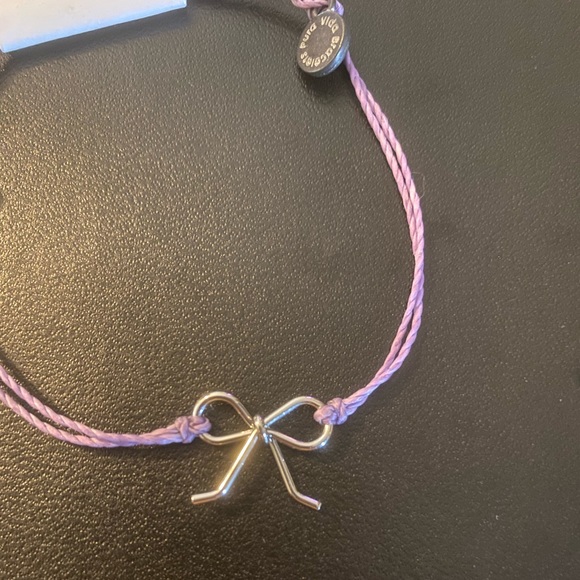 BRAND NEW Silver Bow Charm Bracelet in Light Purple. BY: PURA VIDA - Picture 3 of 5